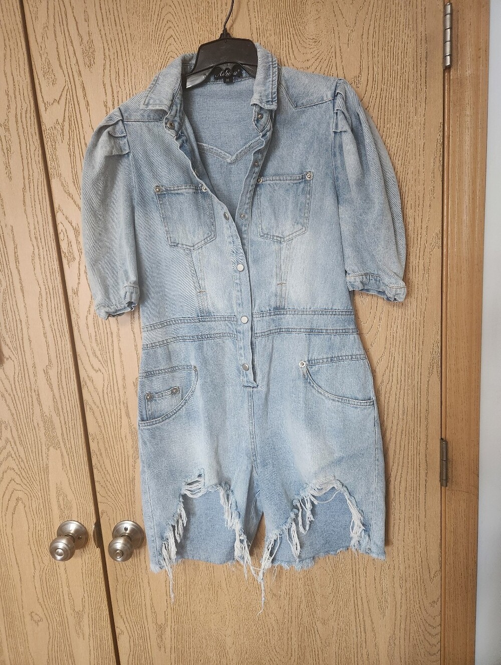 Athina Women's distressed Denim Romper With Puffy Sleeves, Snap Buttoms.